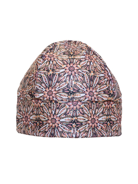 Choucas Glide Ponytail Hat in color || Kalypso Peach